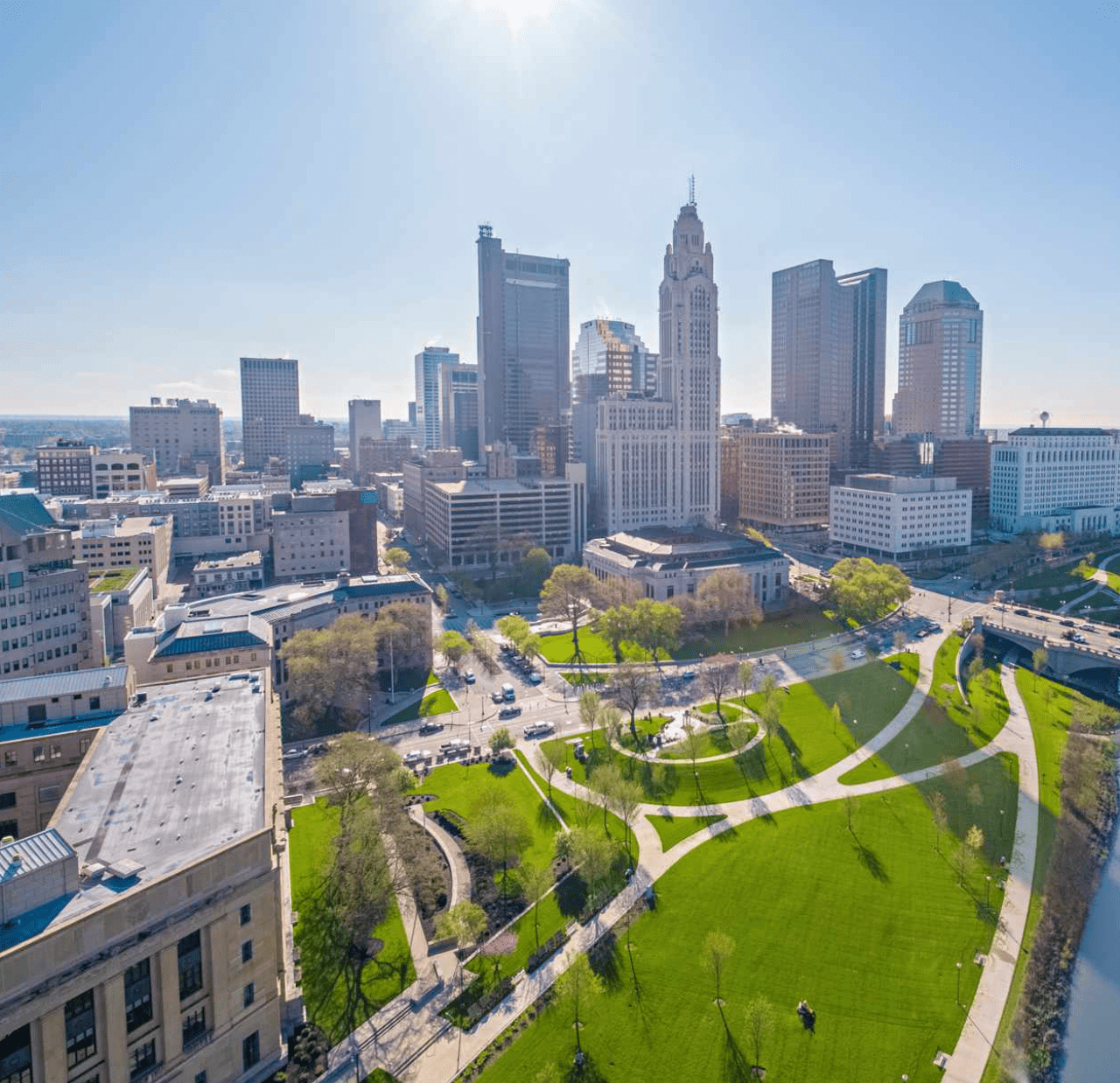 The city of Cleveland, Ohio, showcasing the river and a park, offering a picturesque urban landscape.