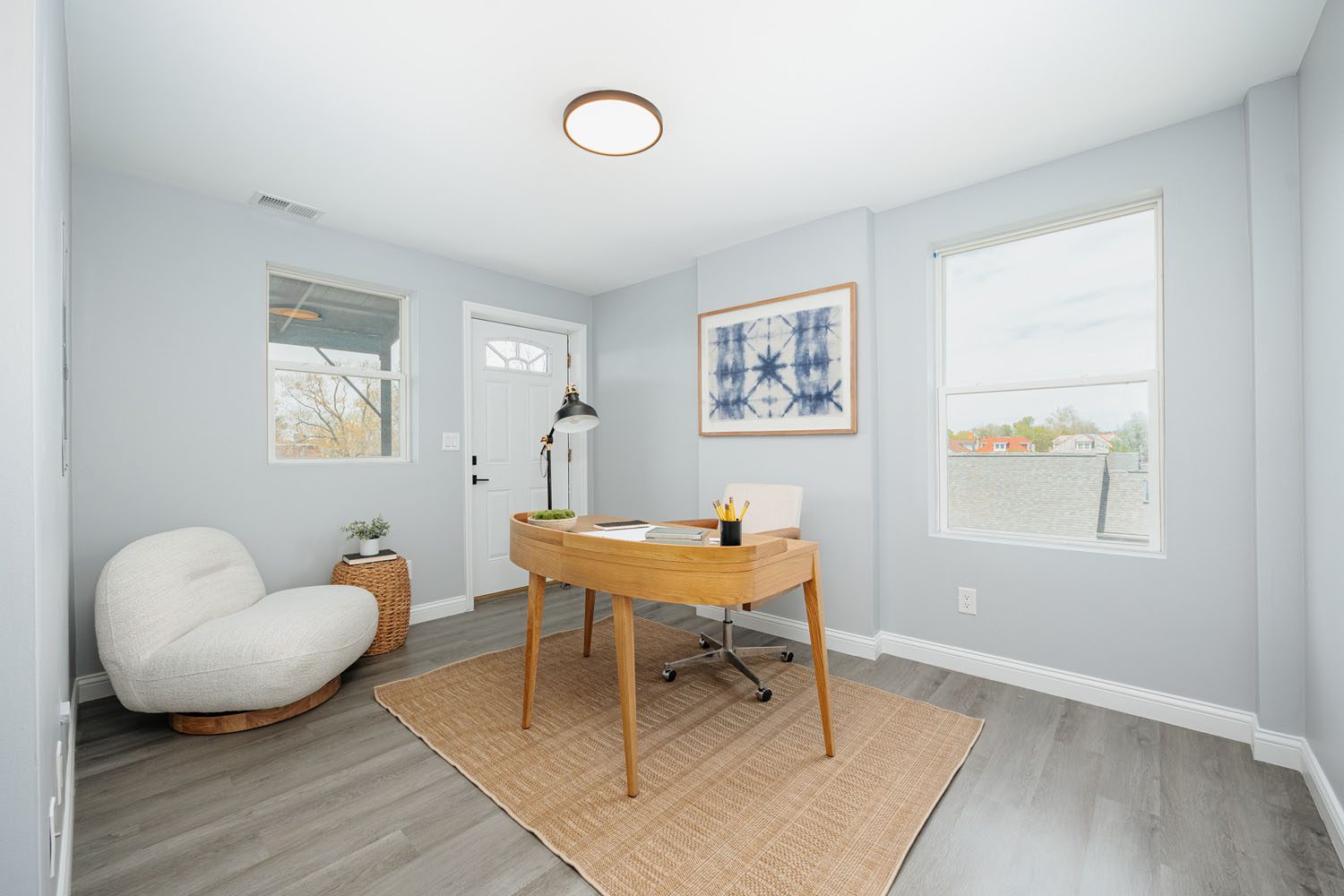 A well-furnished dining room with a wooden table and comfortable chairs for a cozy meal setting.